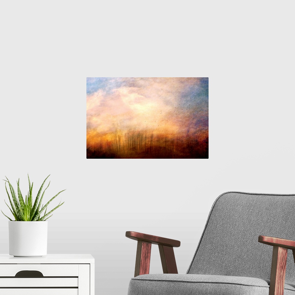A modern room featuring A fine art photograph of a cloud plume dominating the sky as distant birds fly up out of the gras...