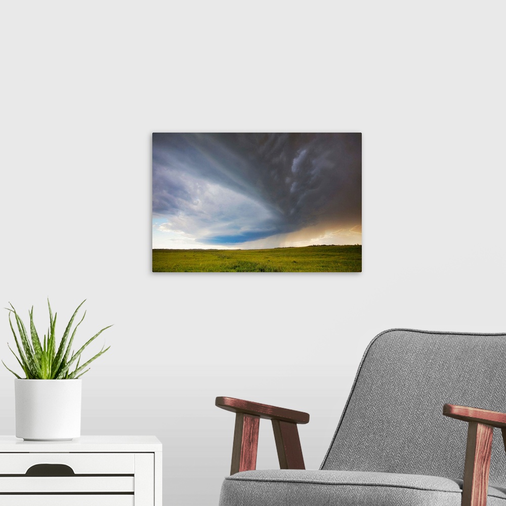 A modern room featuring Pictorial photograph of cloud formations during a severe prairie thunderstorm.