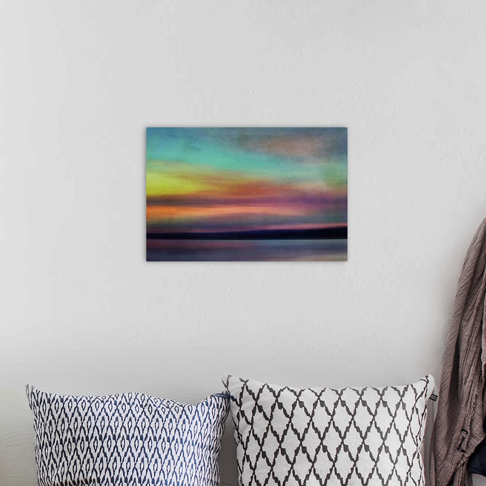 A bohemian room featuring Fine art photograph of an evening skyscape with bright colors from the setting sun.
