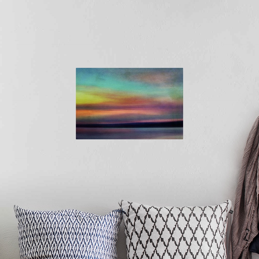 A bohemian room featuring Fine art photograph of an evening skyscape with bright colors from the setting sun.