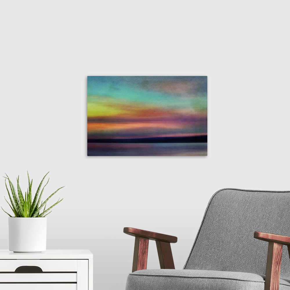 A modern room featuring Fine art photograph of an evening skyscape with bright colors from the setting sun.