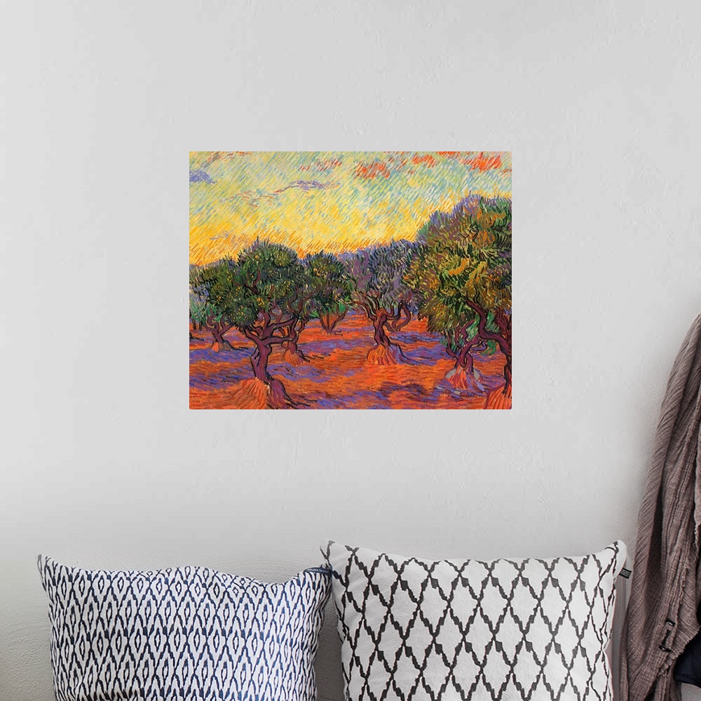 A bohemian room featuring Painting of tree filled meadow.
