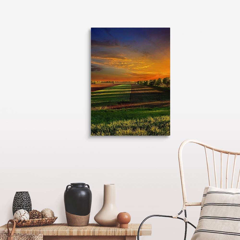 A farmhouse room featuring Dramatic photograph of a countryside scene.