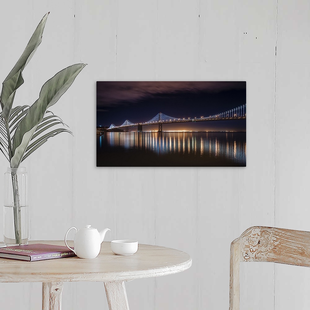 A farmhouse room featuring Photograph of a long bridge lit up at night, San Francisco.