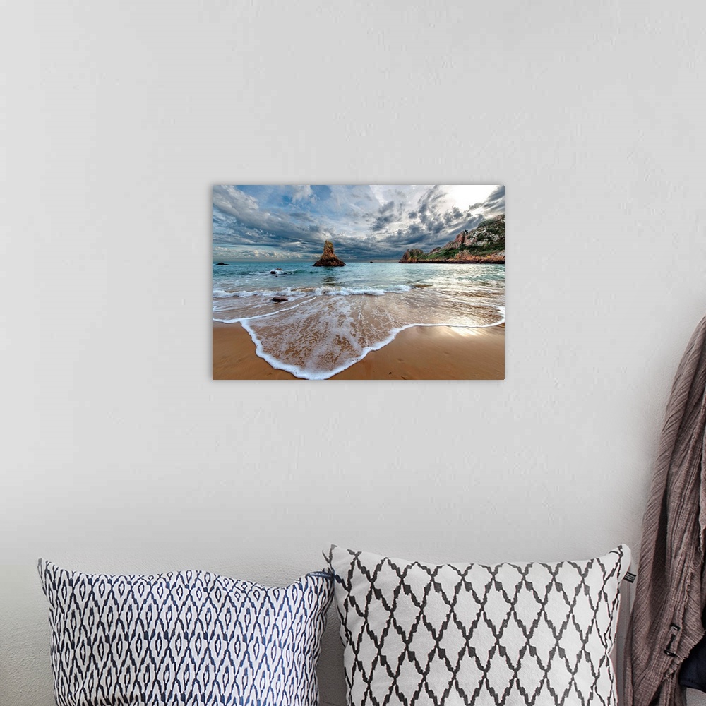 A bohemian room featuring Shallow waves on the beach in Beauport Bay in New Jersey.