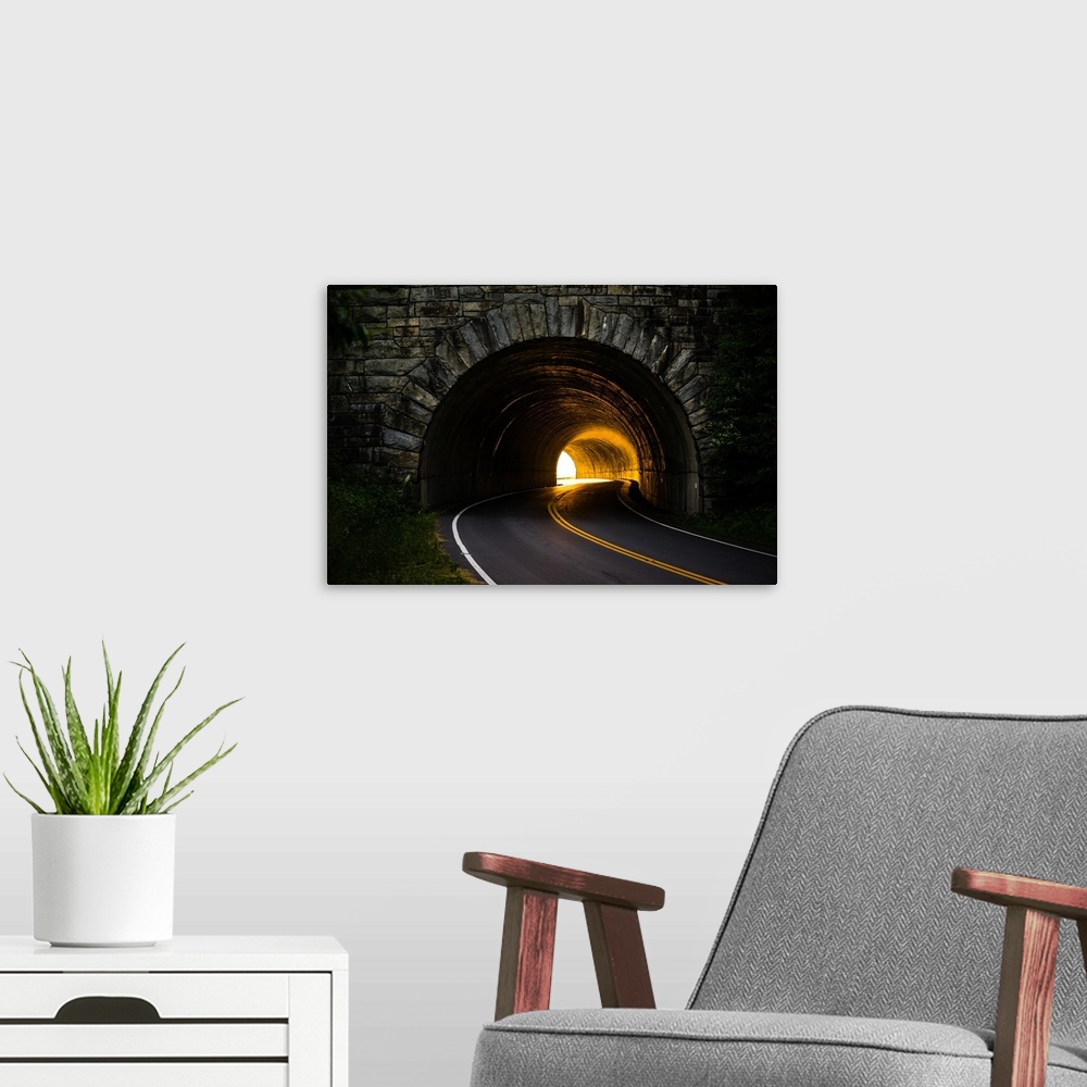 A modern room featuring View through the Buck Spring Tunnel with light on the other side, Blue Ridge Parkway.