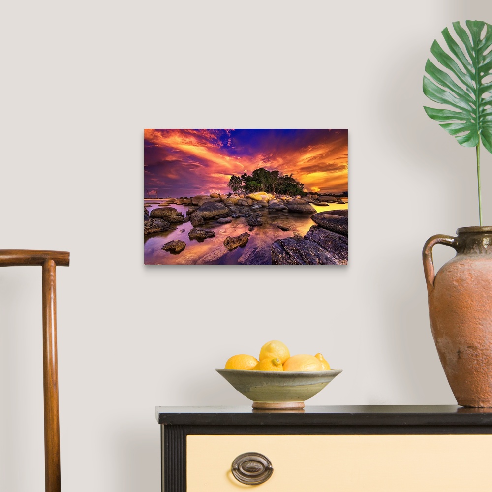 A traditional room featuring Photograph of sunset sky lit up in a blaze of sunlight.