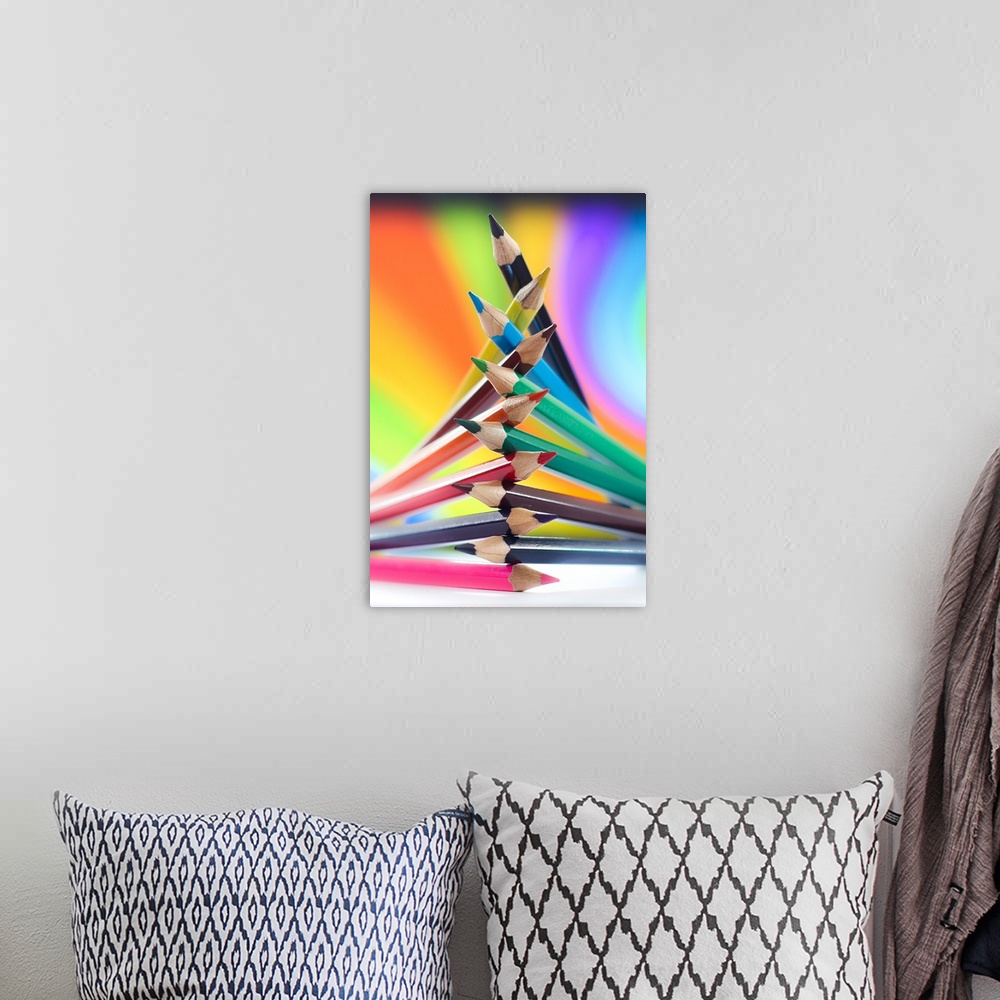 A bohemian room featuring Colored pencils arranged in a pile, with rainbow colors.
