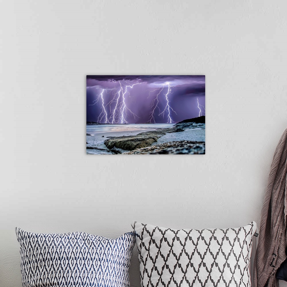 A bohemian room featuring Multiple lightning strikes over the ocean near Denmark, Western Australia.