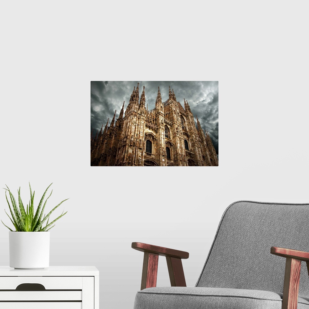 A modern room featuring Cathedral under a stormy sky, Milan, Italy.