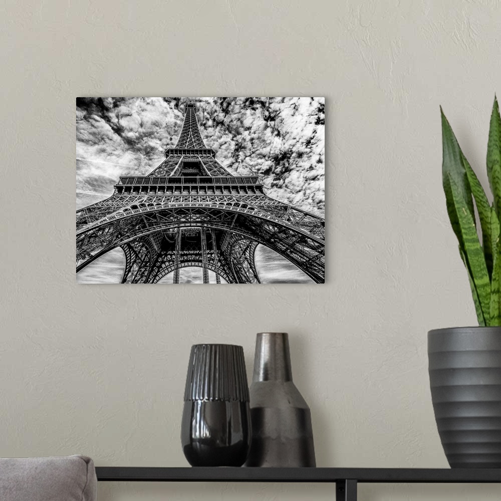 A modern room featuring High contrast black and white photo of the Eiffel Tower.