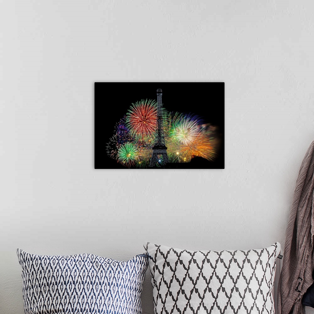 A bohemian room featuring Fireworks exploding in the air behind the Eiffel Tower in Paris.