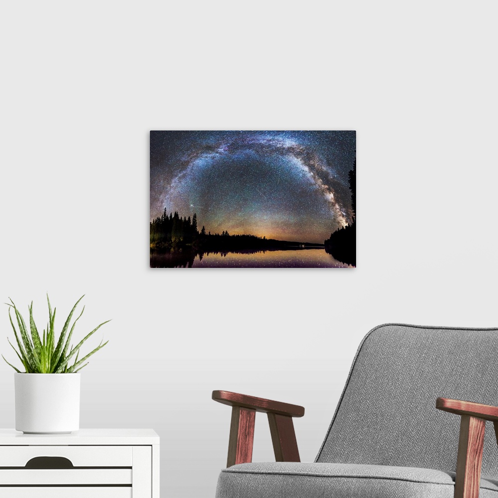 A modern room featuring The Milky Way seen in the night sky over a lake, Oregon.