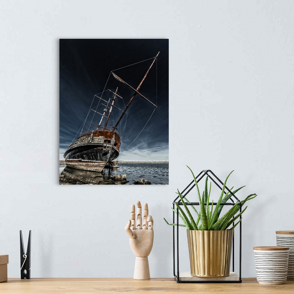 A bohemian room featuring Rusty old ship on the shore of Lake Ontario.