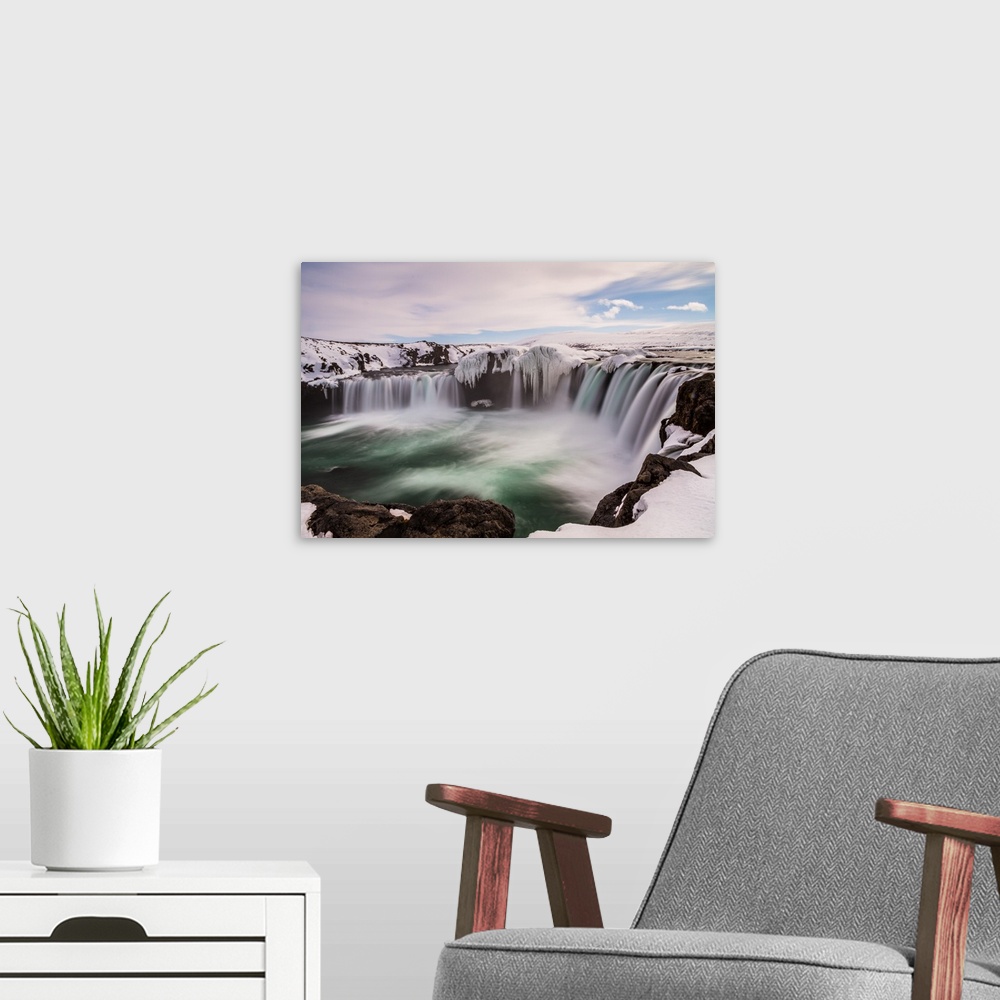 A modern room featuring The Godafoss (Icelandic: waterfall of the gods or waterfall of the godi) is one of the most spect...