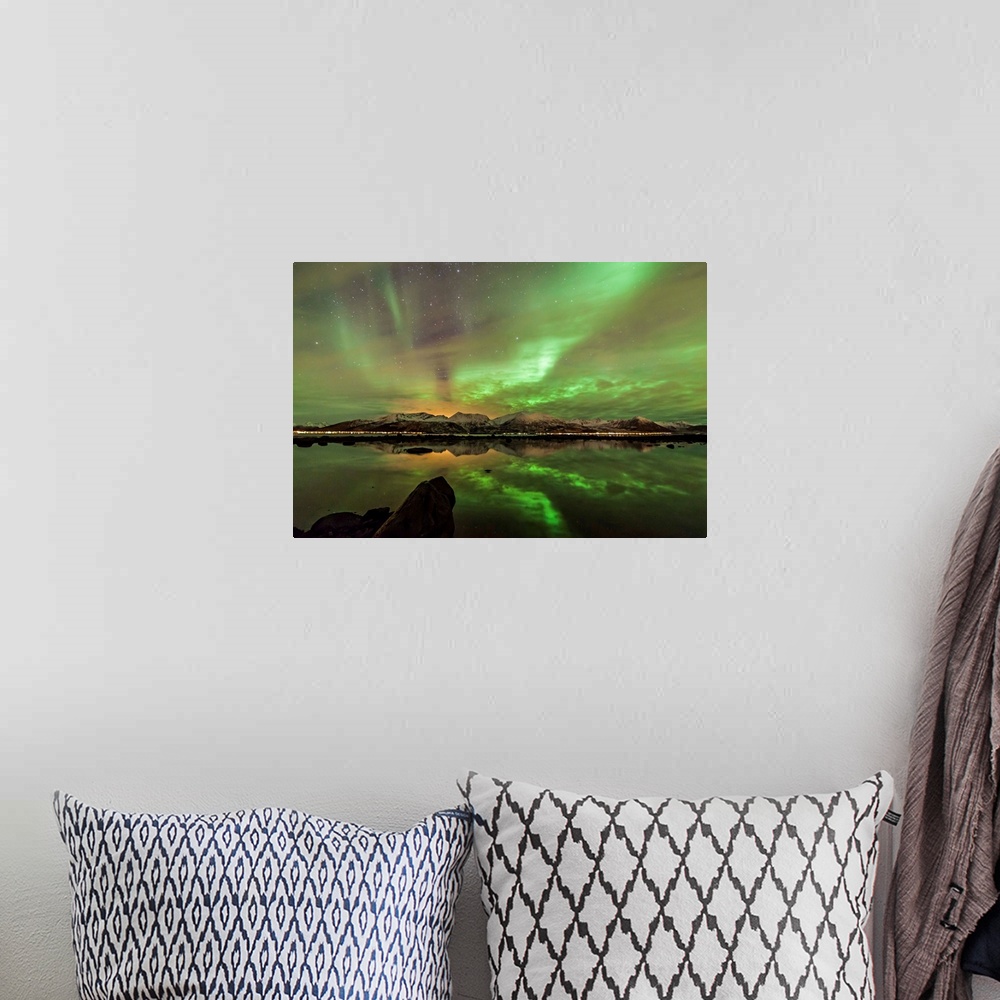 A bohemian room featuring Northern lights seen from Buksnes, Andoya island. Skjoldehamn at the other side, Norway.