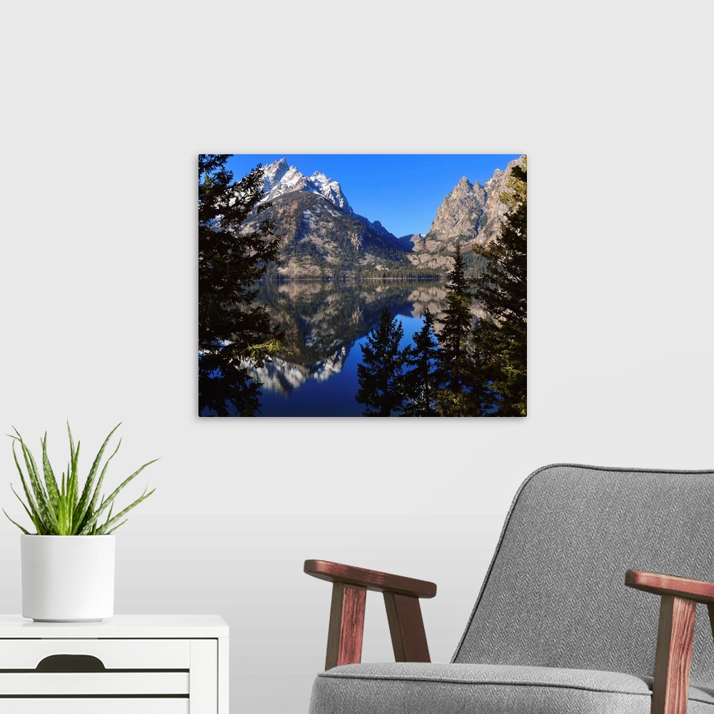 A modern room featuring Jenny Lake in the Grand Tetons National Park.