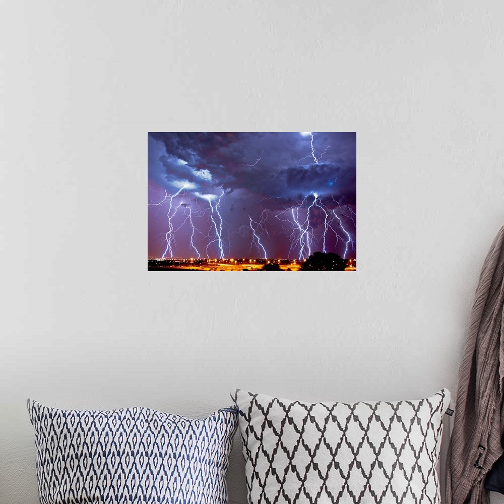 A bohemian room featuring Multiple exposures of a lightning storm over South Africa.