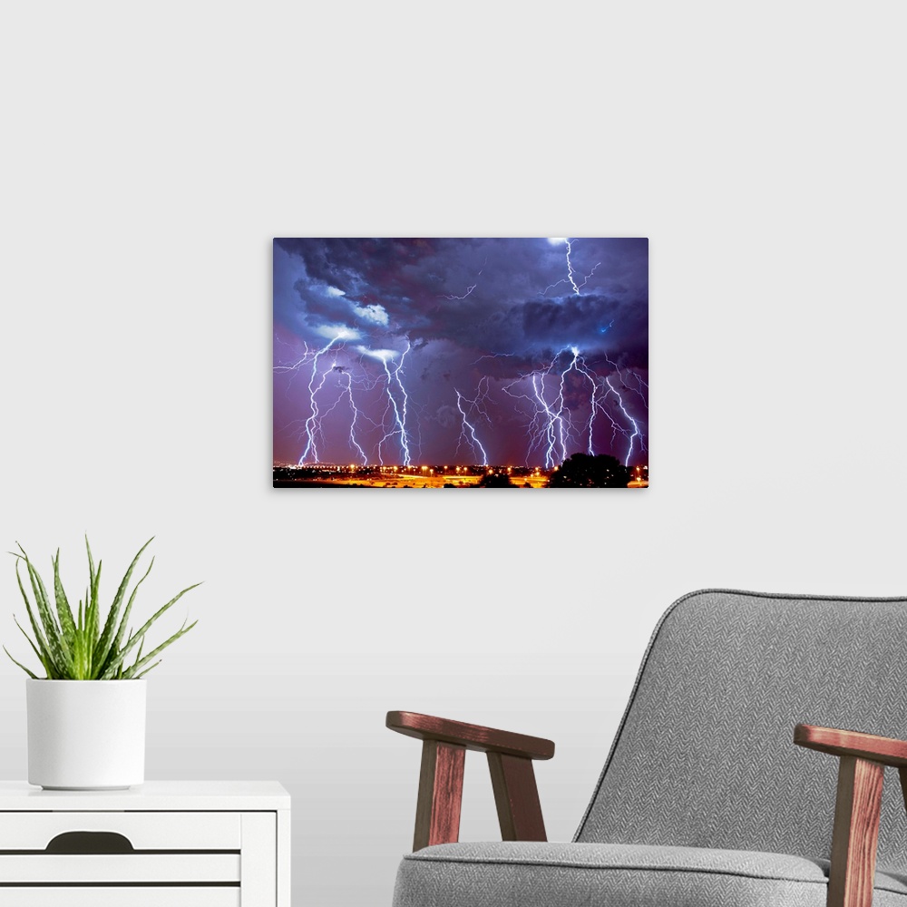 A modern room featuring Multiple exposures of a lightning storm over South Africa.