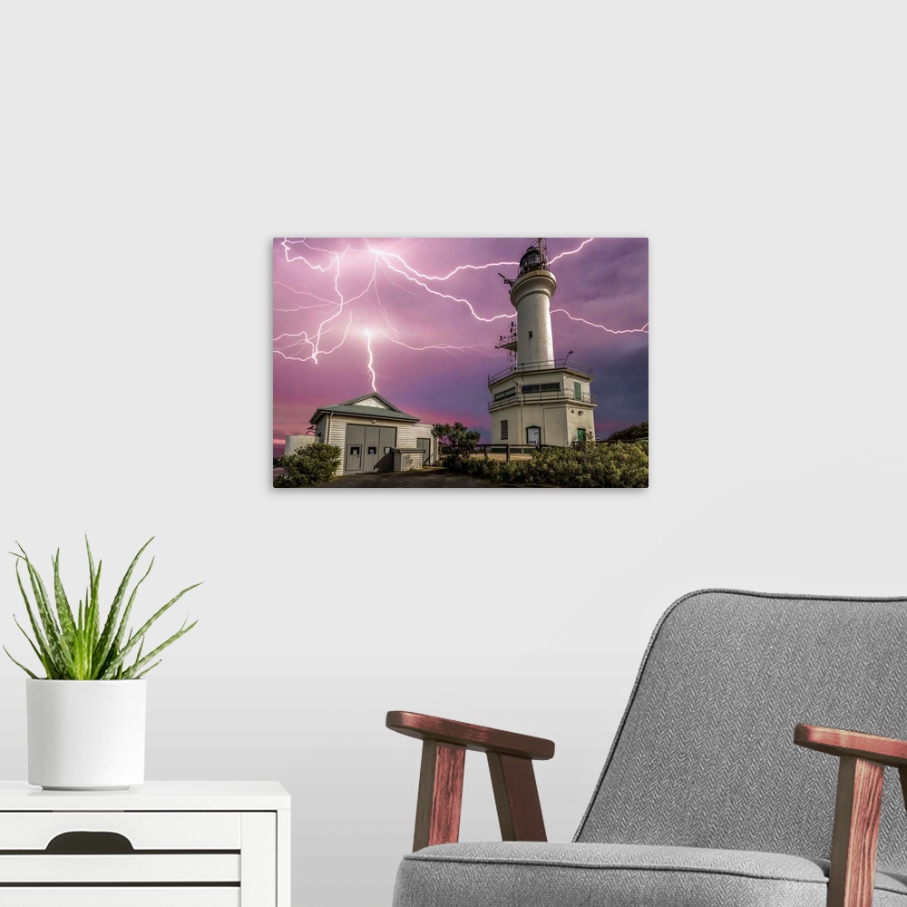 A modern room featuring Lightning strikes over the lighthouse at Point Lonsdale, Victoria, Australia.