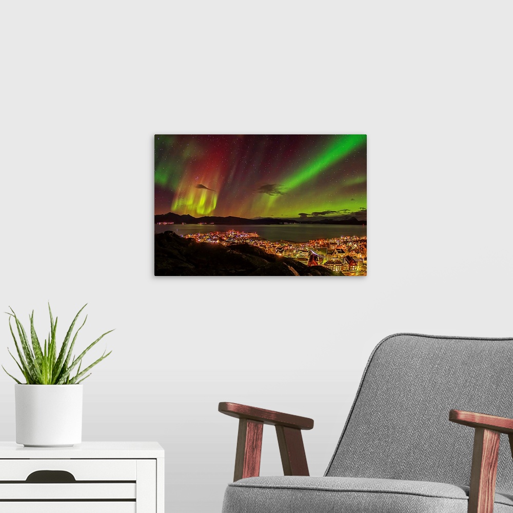 A modern room featuring Colorful northern lights over the village of Lodingen in Nordland, Norway.