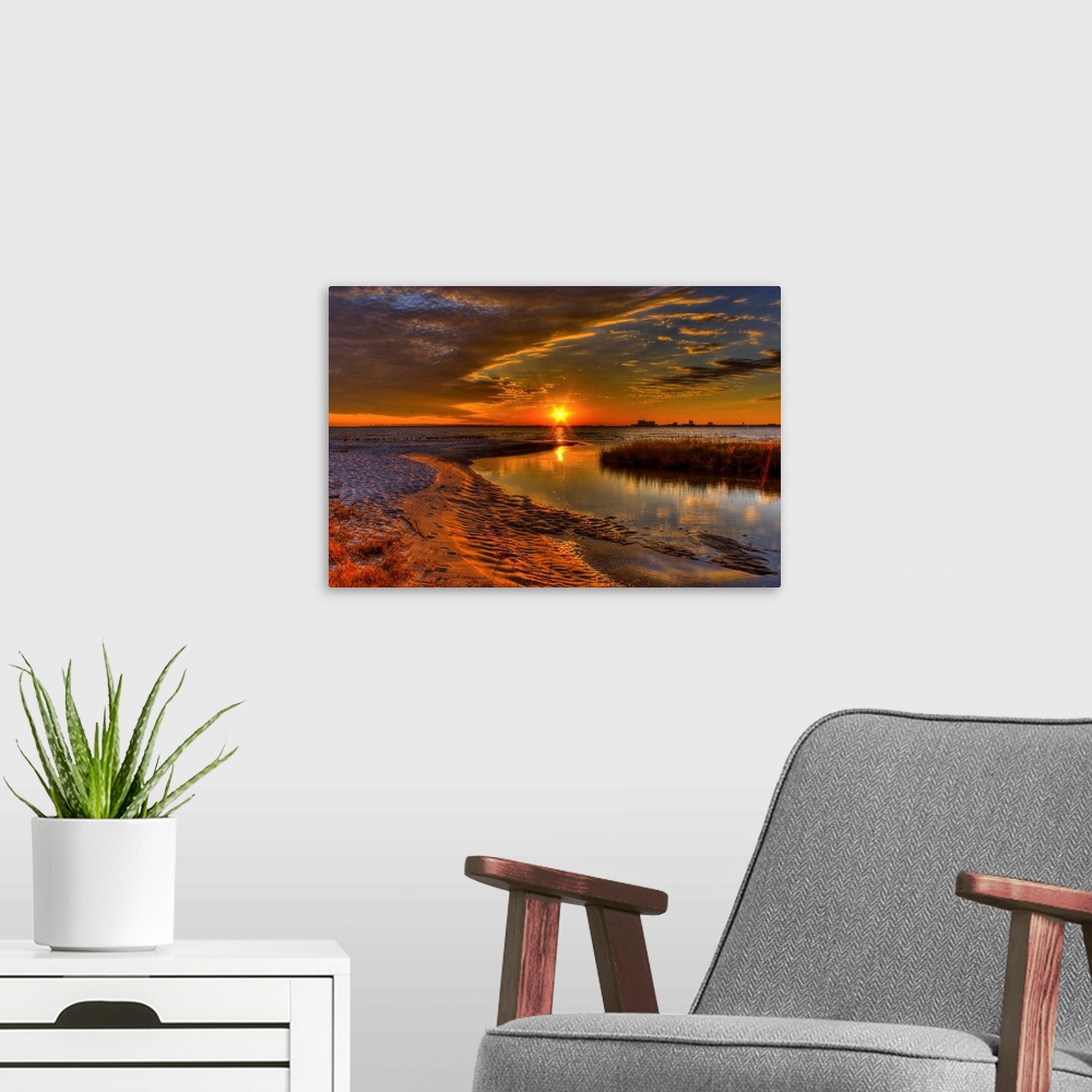 A modern room featuring Sunset from Ocean Springs, Mississippi.