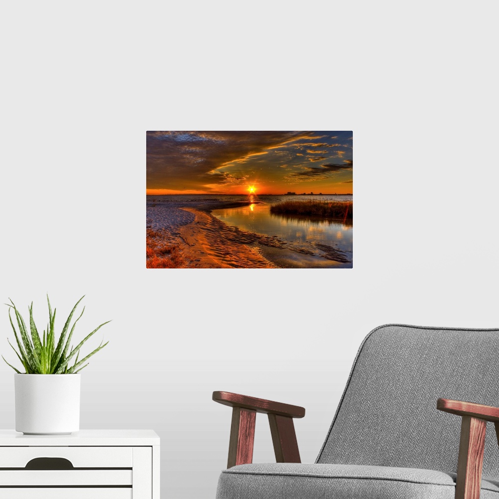 A modern room featuring Sunset from Ocean Springs, Mississippi.