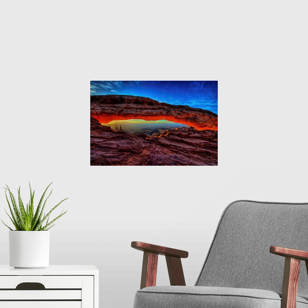 A modern room featuring A spectacular sunrise at Mesa Arch, Utah.