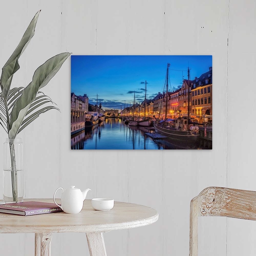 A farmhouse room featuring Waterfront with boats in the evening, Copenhagen, Denmark.