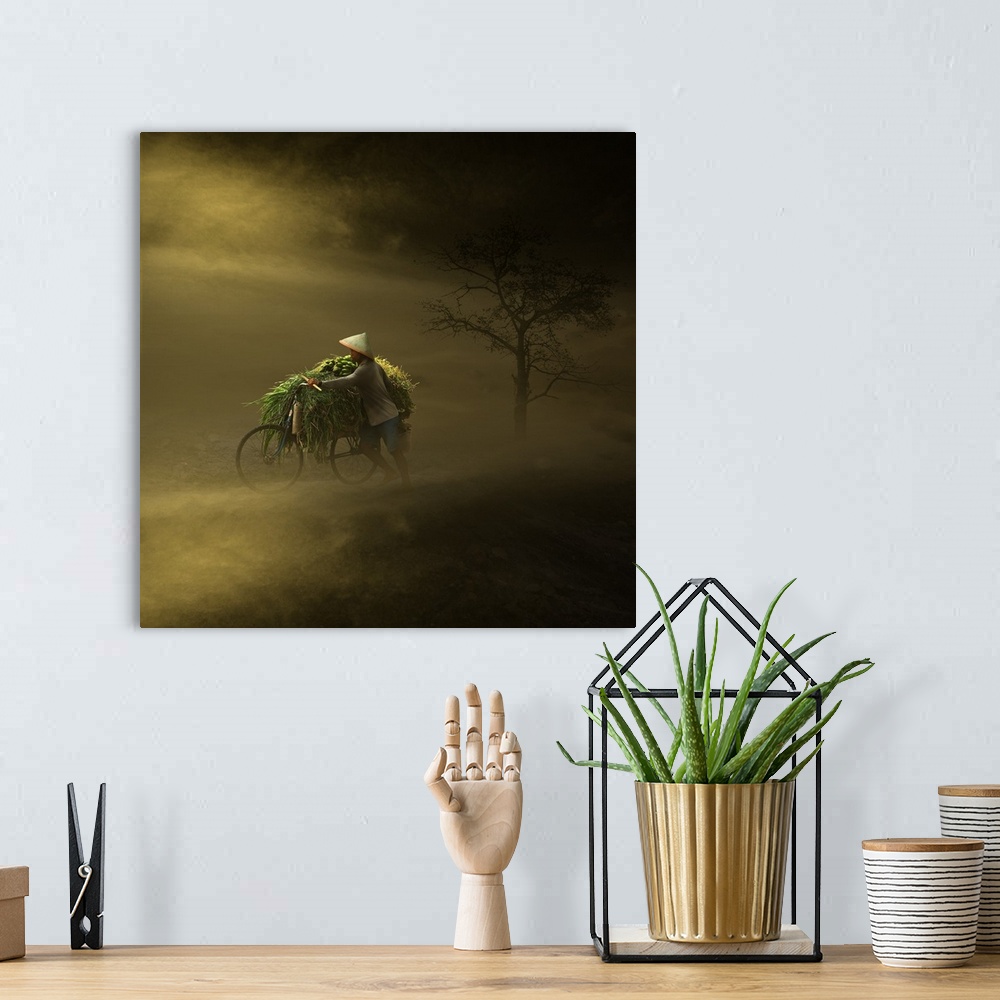 A bohemian room featuring A farmer pushes their bicycle through a heavily fogged landscape.