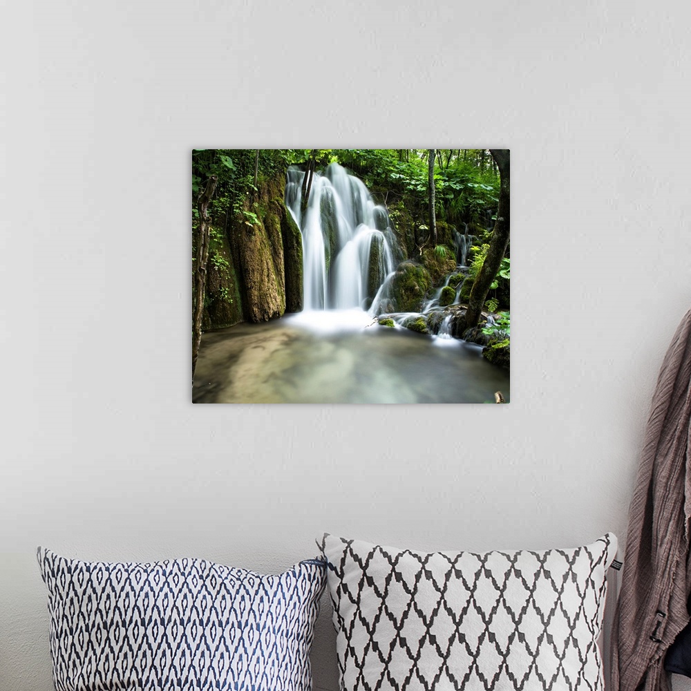A bohemian room featuring Lovely little waterfall in Plitvice Lakes National Park, Croatia.