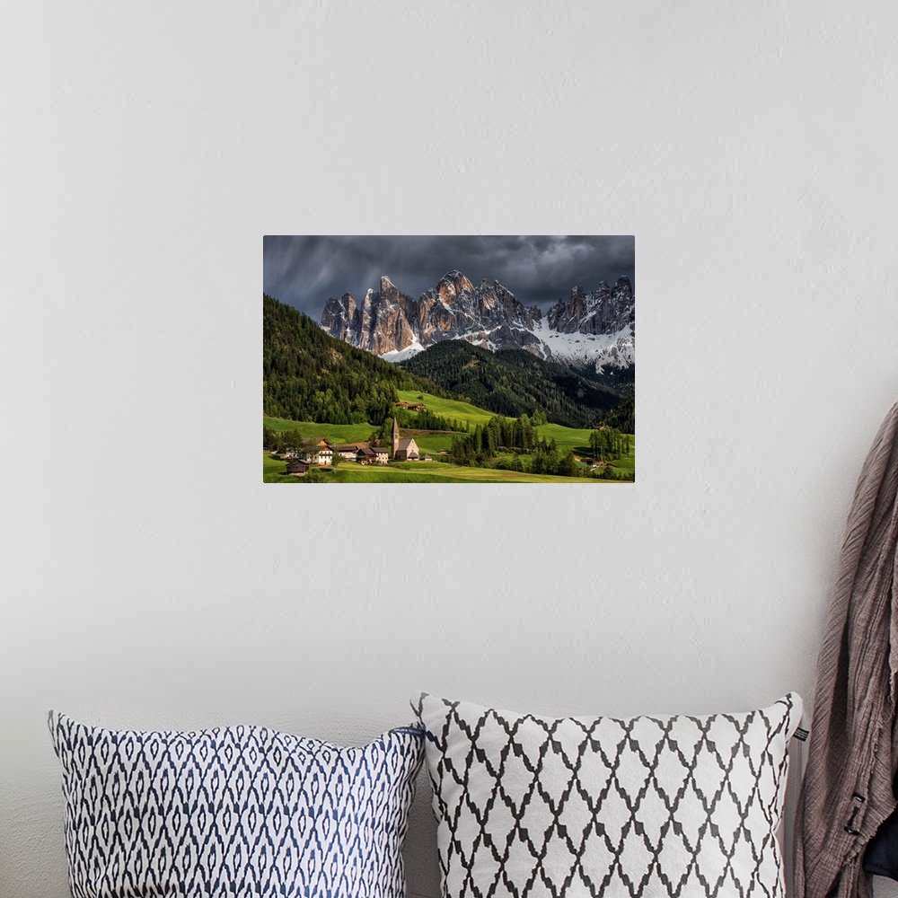A bohemian room featuring The Alpine village of Santa Maddalena, in the Val di Funes. The background mountains are the Odle...