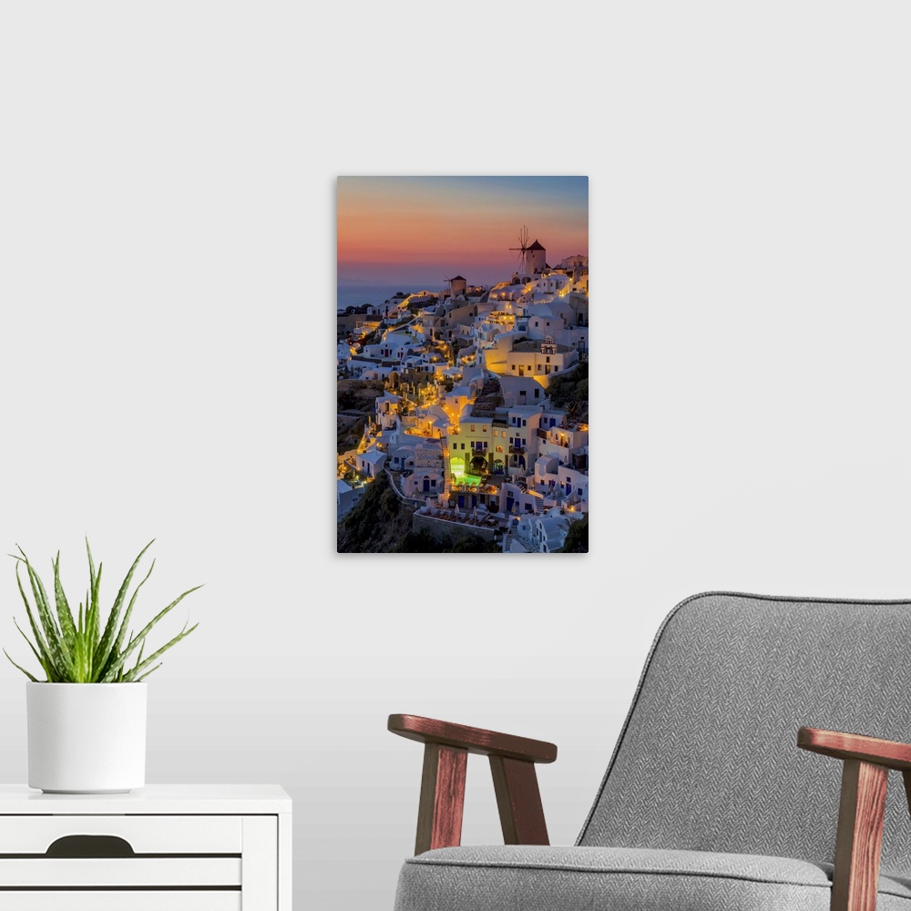 A modern room featuring Aerial view of Santorini in Greece at sunset.