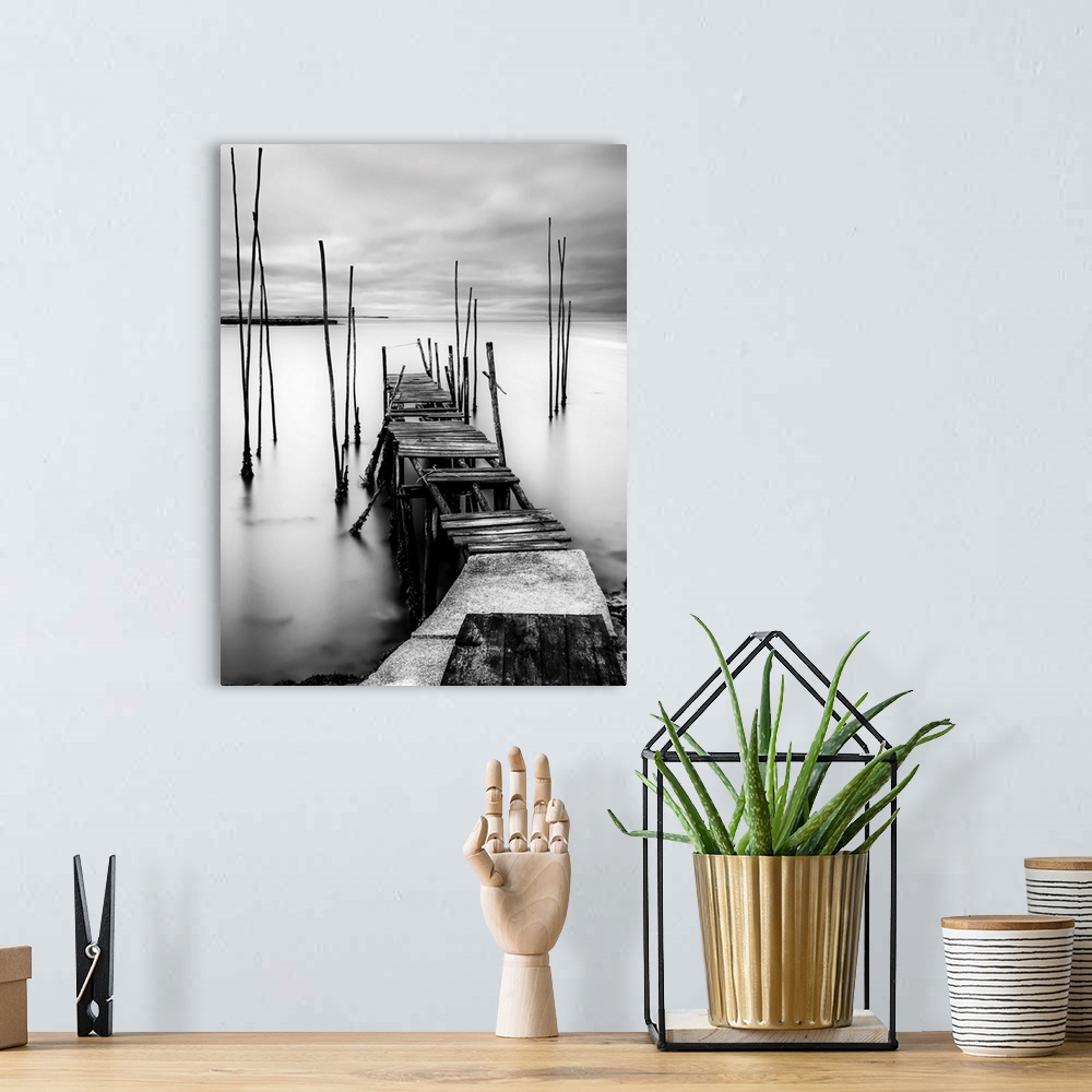 A bohemian room featuring A worn out old pier with missing planks.