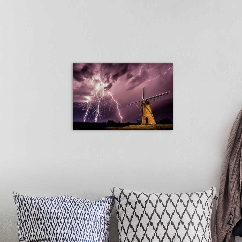 A bohemian room featuring Lightning storm over a windmill in Western Australia.