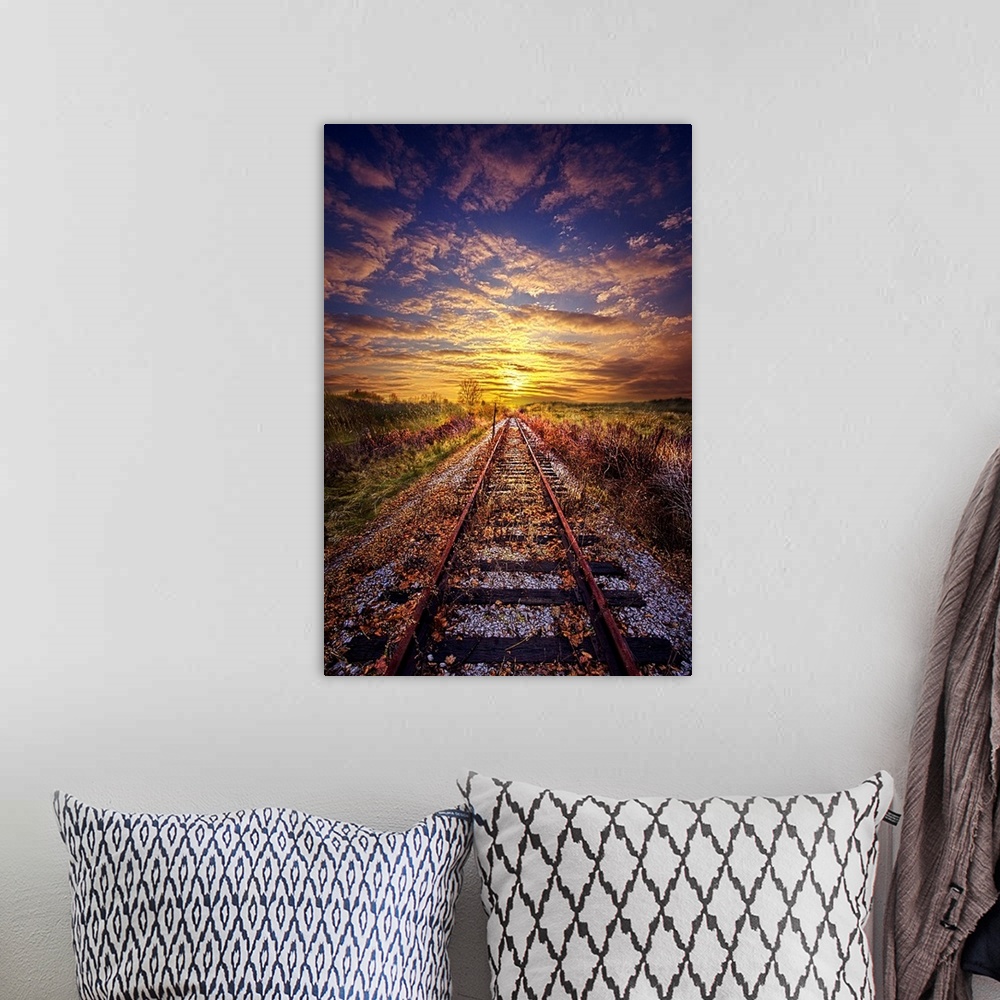 A bohemian room featuring Railroad tracks leading to the horizon at sunset, Wisconsin.