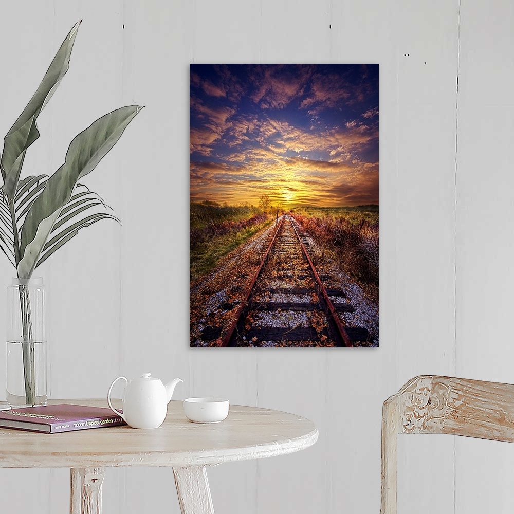 A farmhouse room featuring Railroad tracks leading to the horizon at sunset, Wisconsin.