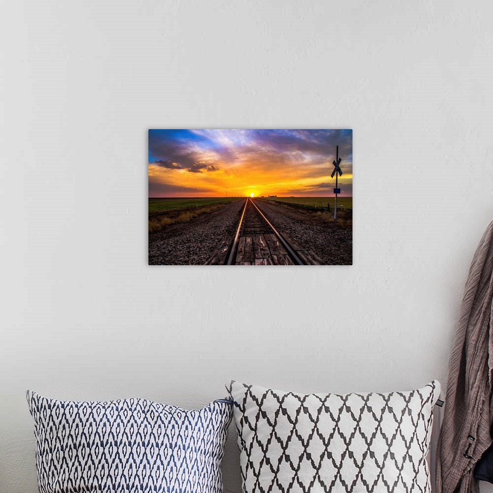 A bohemian room featuring Sunset on Tracks