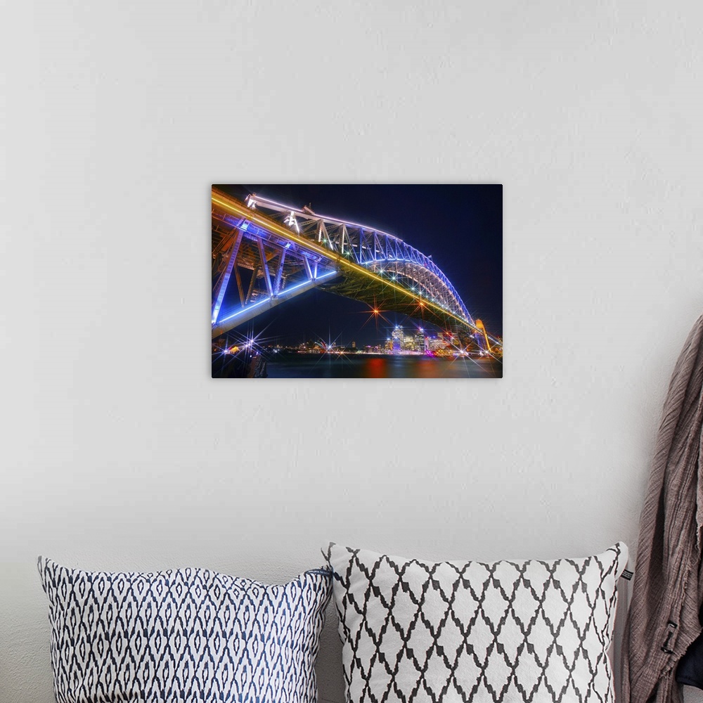 A bohemian room featuring Photograph of the Sydney Harbor skyline from under the massive neon lit bridge.
