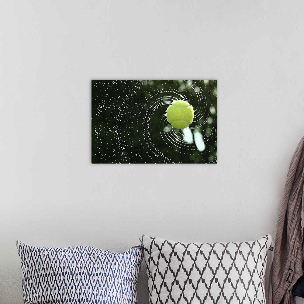 A bohemian room featuring Tennis ball soaked in water thrown with a top spin.