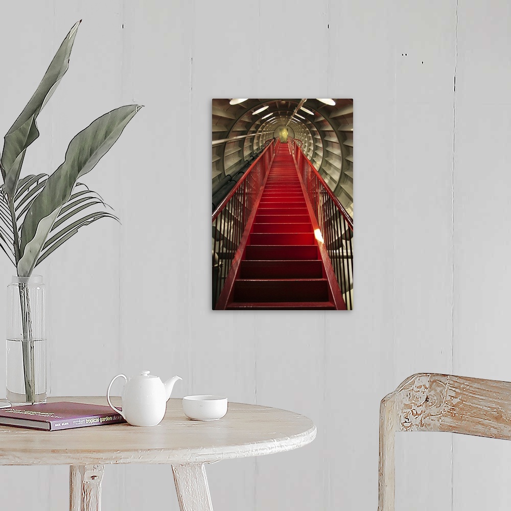 A farmhouse room featuring The Red Stairs