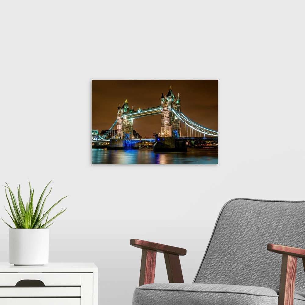 A modern room featuring Tower Bridge, London on a wet, cold January evening.