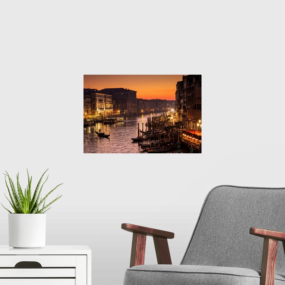 A modern room featuring Venice at dusk, taken from Rialto Bridge.