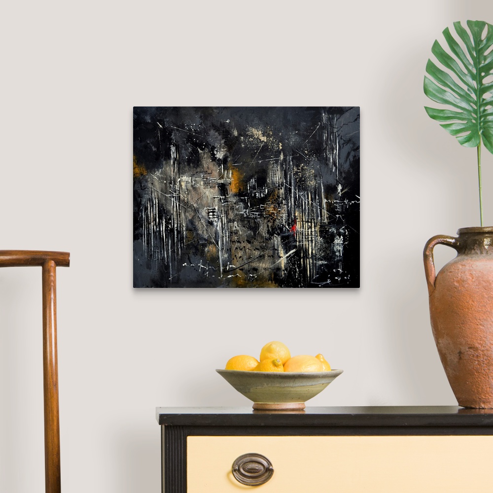 A traditional room featuring Abstract painting in dark shades of black, white and gray with splatters of paint overlapping and...