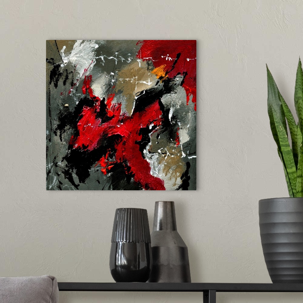 A modern room featuring A square abstract painting with deep textured colors of red and gray.