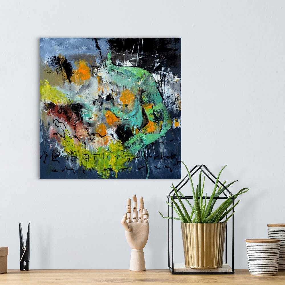 A bohemian room featuring A square abstract painting in dark shades of green, gray, orange and yellow with splatters of pai...
