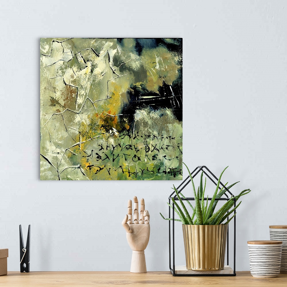 A bohemian room featuring A square abstract painting in textured shades of black, green and yellow with splatters of paint ...