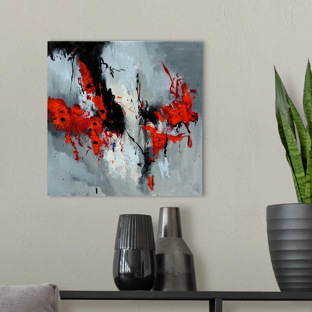 A modern room featuring A square abstract painting in textured shades of black, red, white and gray with splatters of pai...