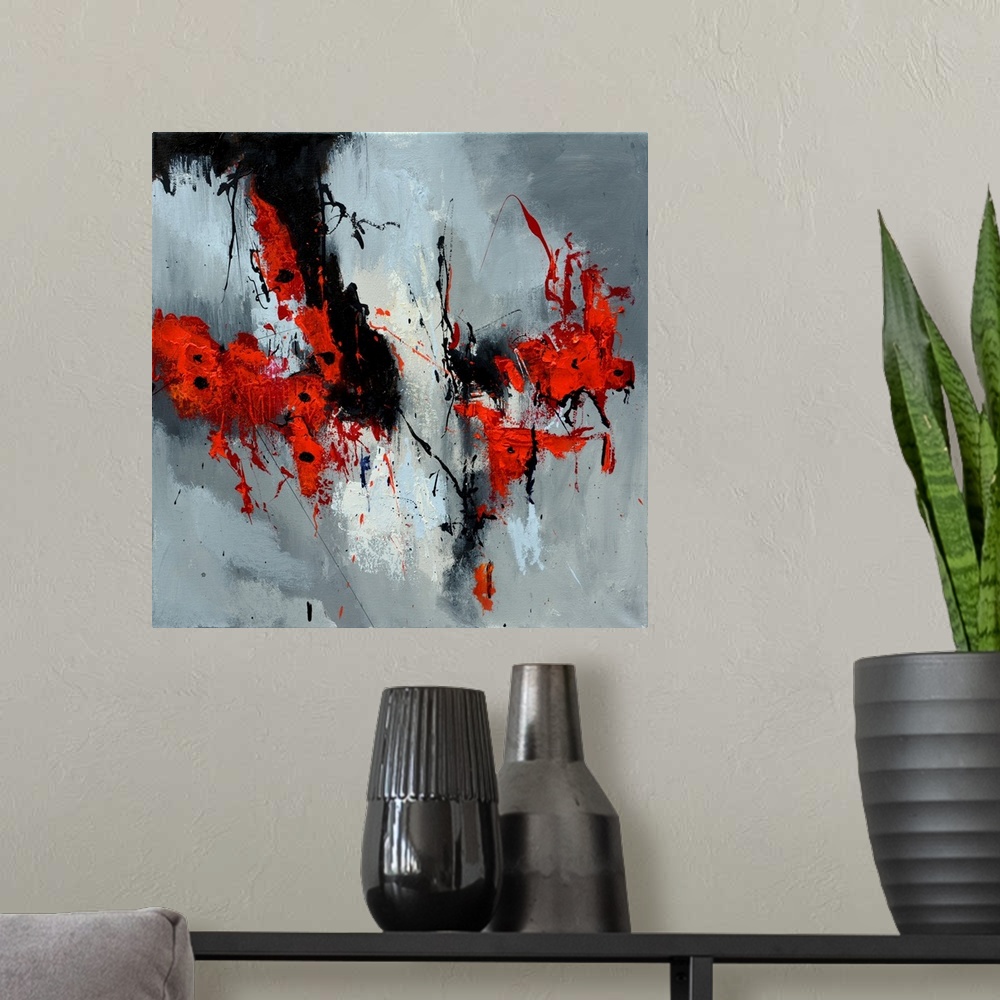 A modern room featuring A square abstract painting in textured shades of black, red, white and gray with splatters of pai...