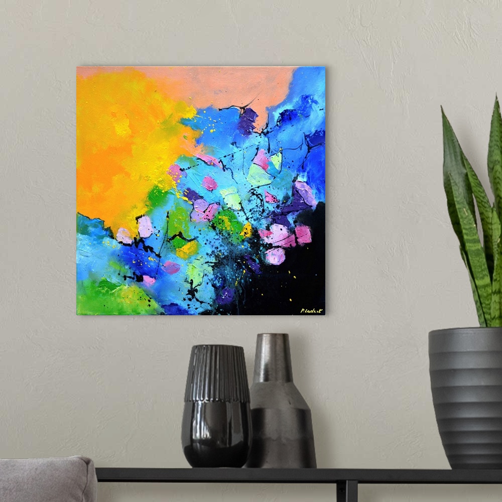 A modern room featuring Contemporary abstract painting in bright hues.